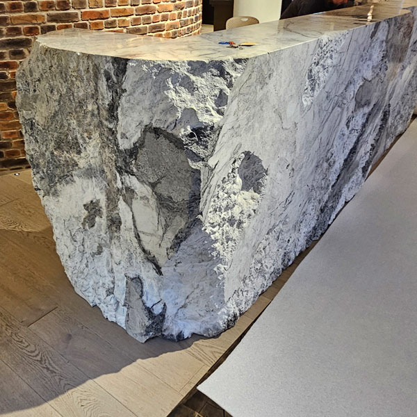 Bespoke  protection manufactured on site for marble desk section