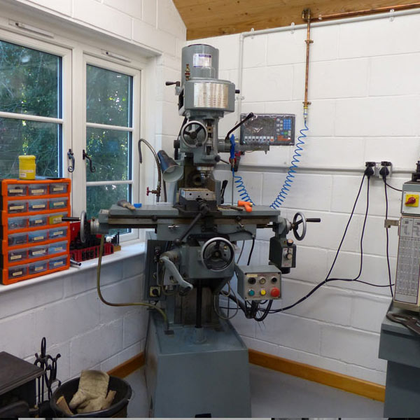 Milling machine lifting and moving using specialist equipment for controlled relocation